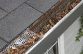 How to clean gutters from the ground?