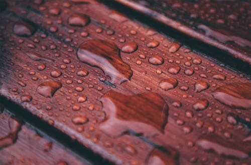 How long after staining a deck can it rain?